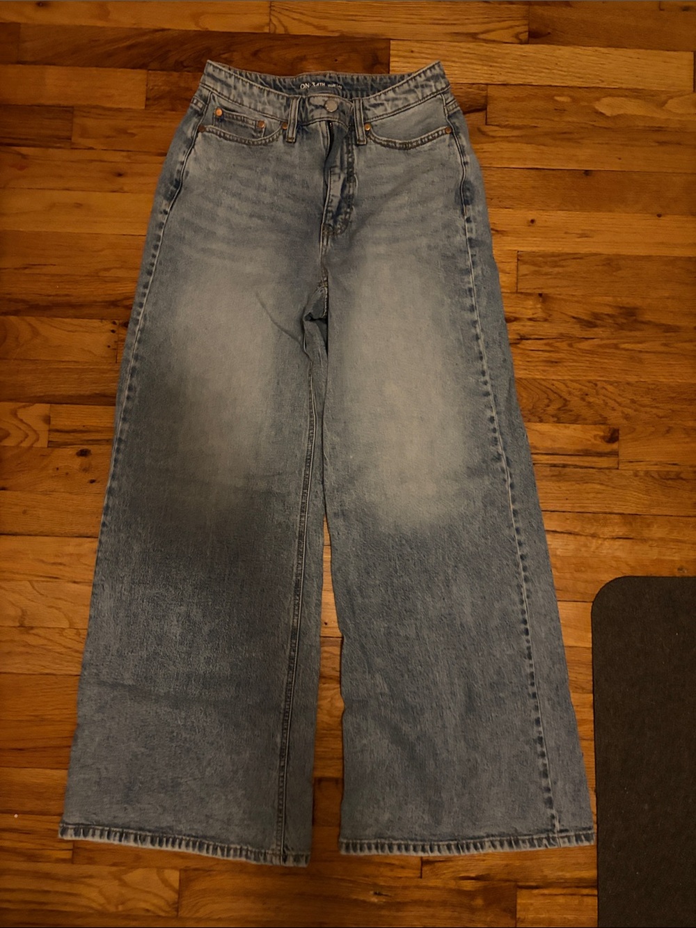 High-Rise Wide Leg Jeans in Faded Blue Wash